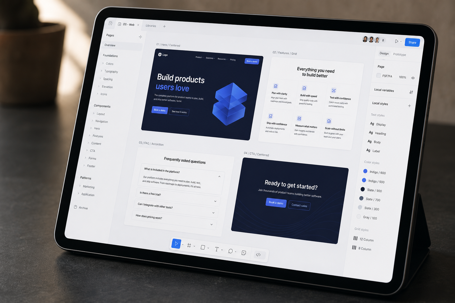 Tablet displaying a website redesign design system with reusable section components