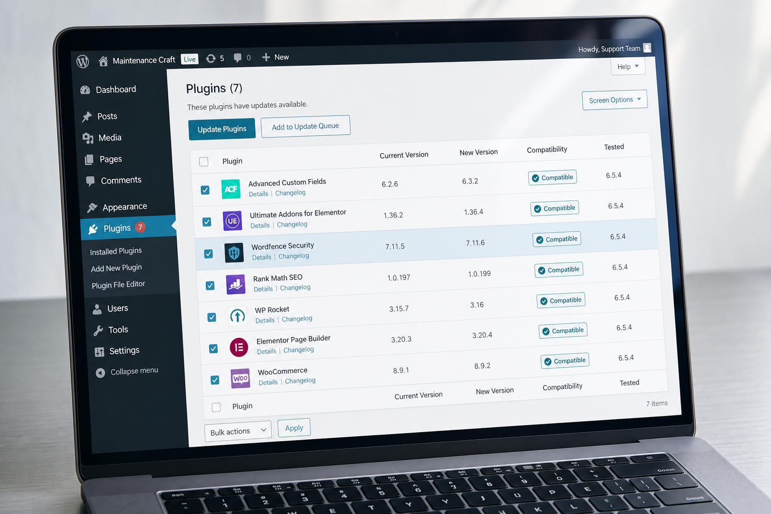 WordPress plugin update queue with compatibility tested badges